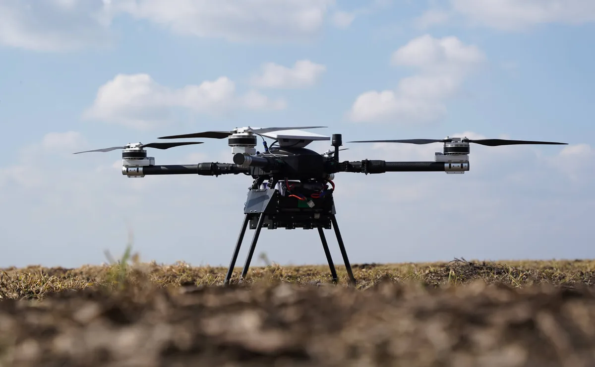 ADIS heavy multicopter standing on a bare field