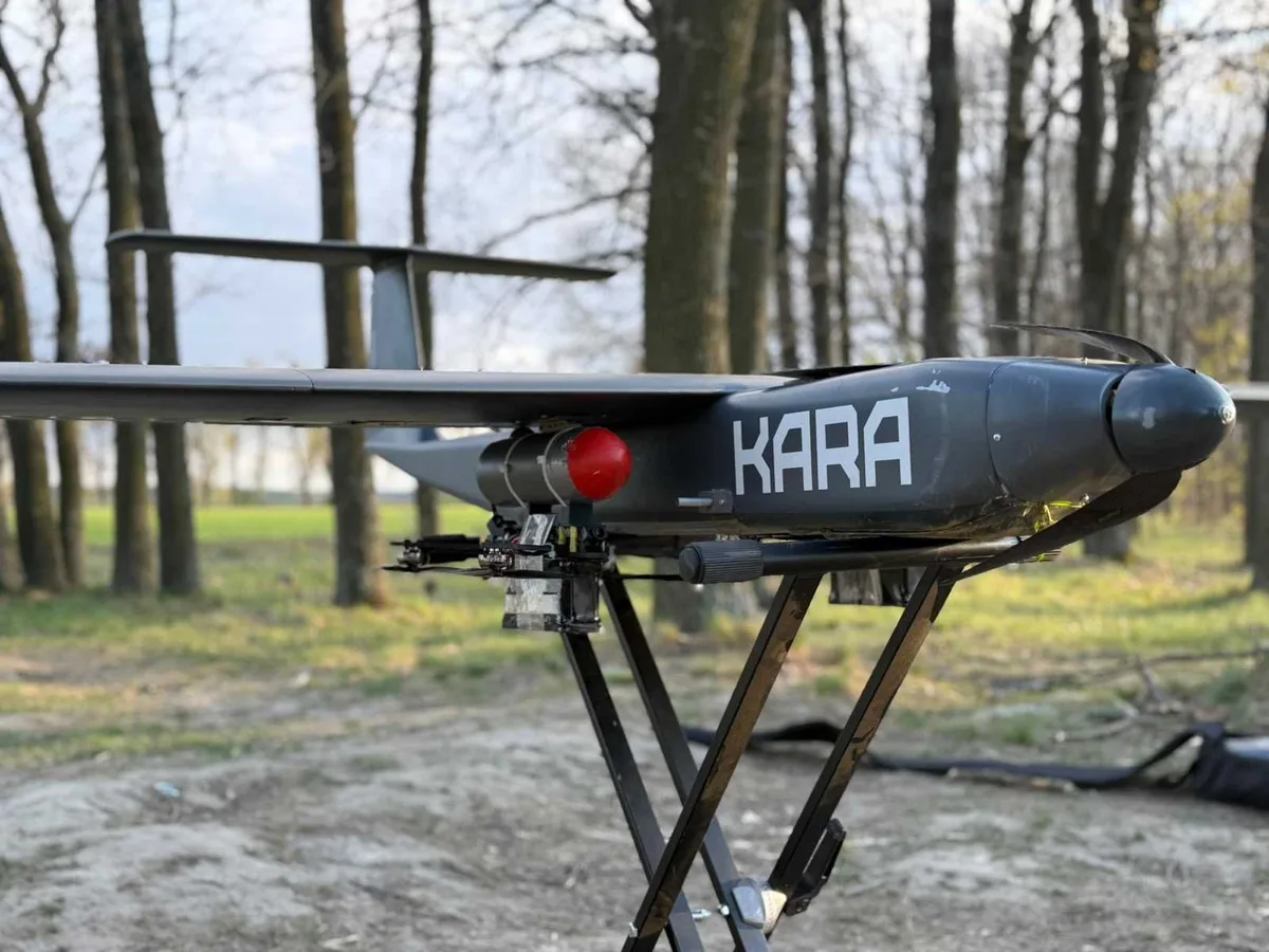 KARA fixed-wing drone on its launch catapult among trees