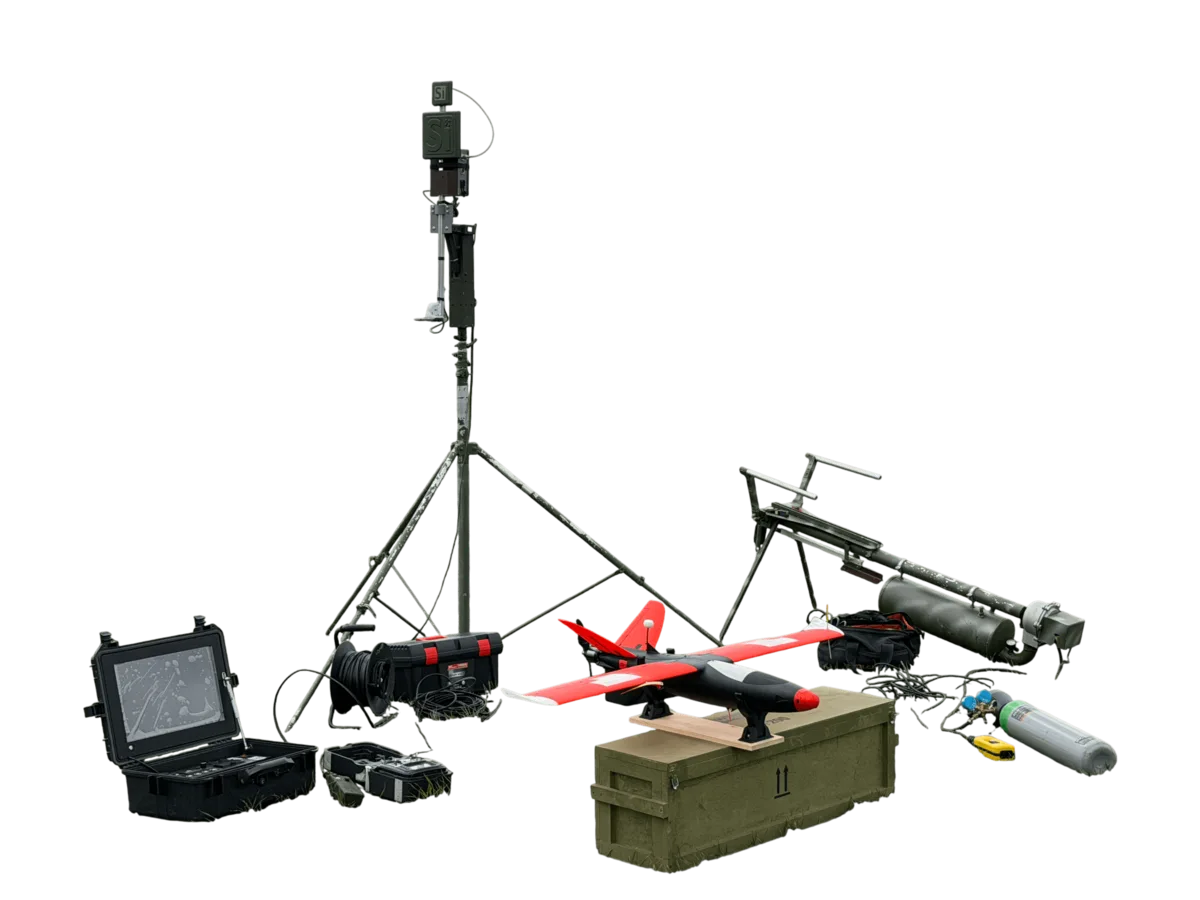 LAST SHADOW kit: a red fixed-wing interceptor, launcher crate, control case and catapult