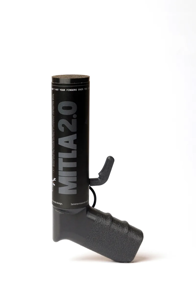 MITLA 2.0 hand-held net launcher on a white background