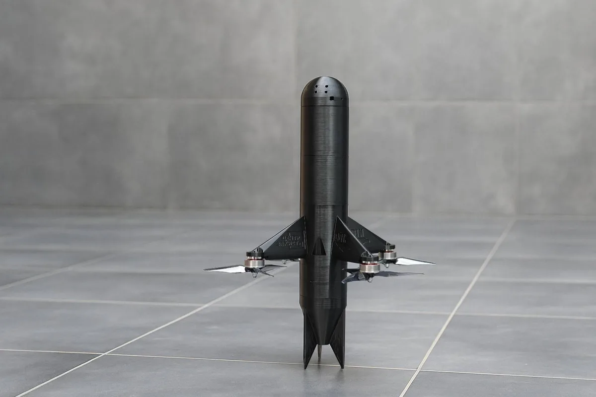 Win_Hit missile-shaped interceptor standing on its tail fins